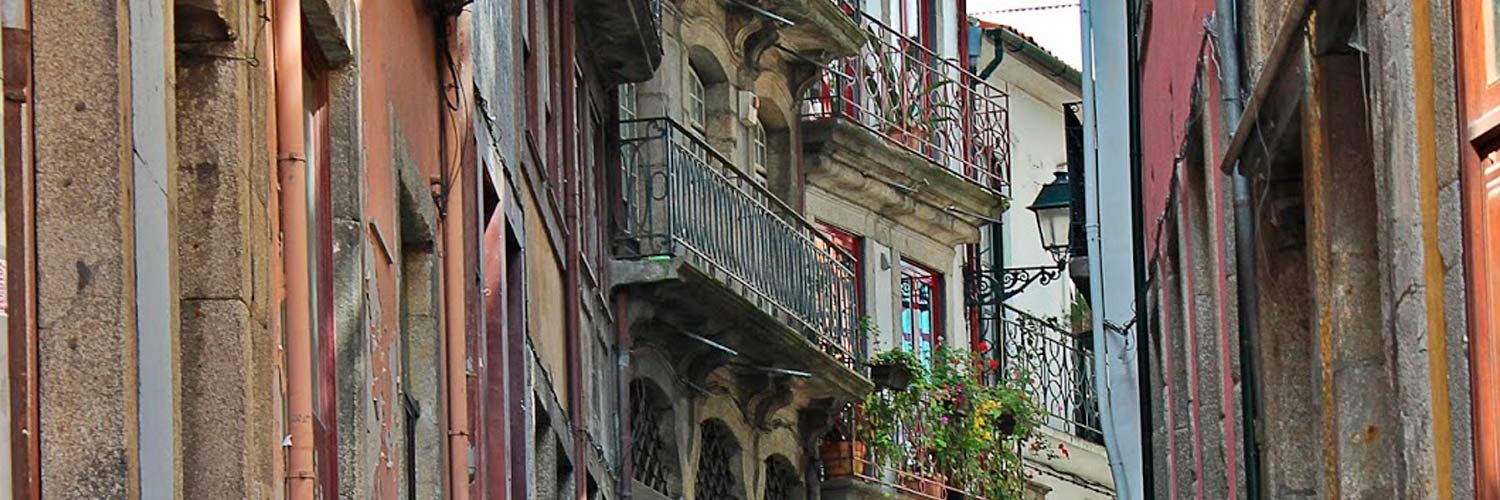 Historic Ribeira area, with balconies covered in plants.